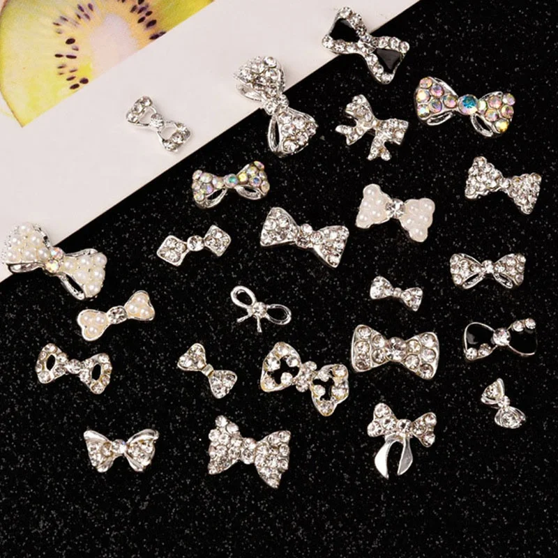 

Paso Sico 24 Designs Mini Butterfly Bow Nail Art Jewelry Products Diamond Rhinestones Pearls Nail Art Charms