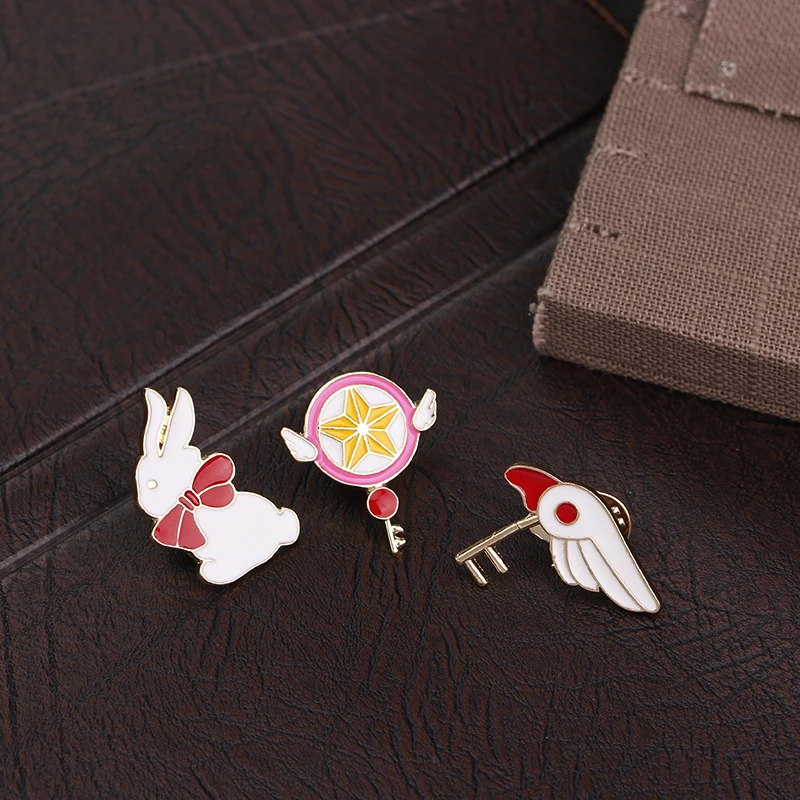 

Fashion hot sale anime cartoon star staff bird head rabbit pattern brooch wholesale custom alloy drip oil brooches