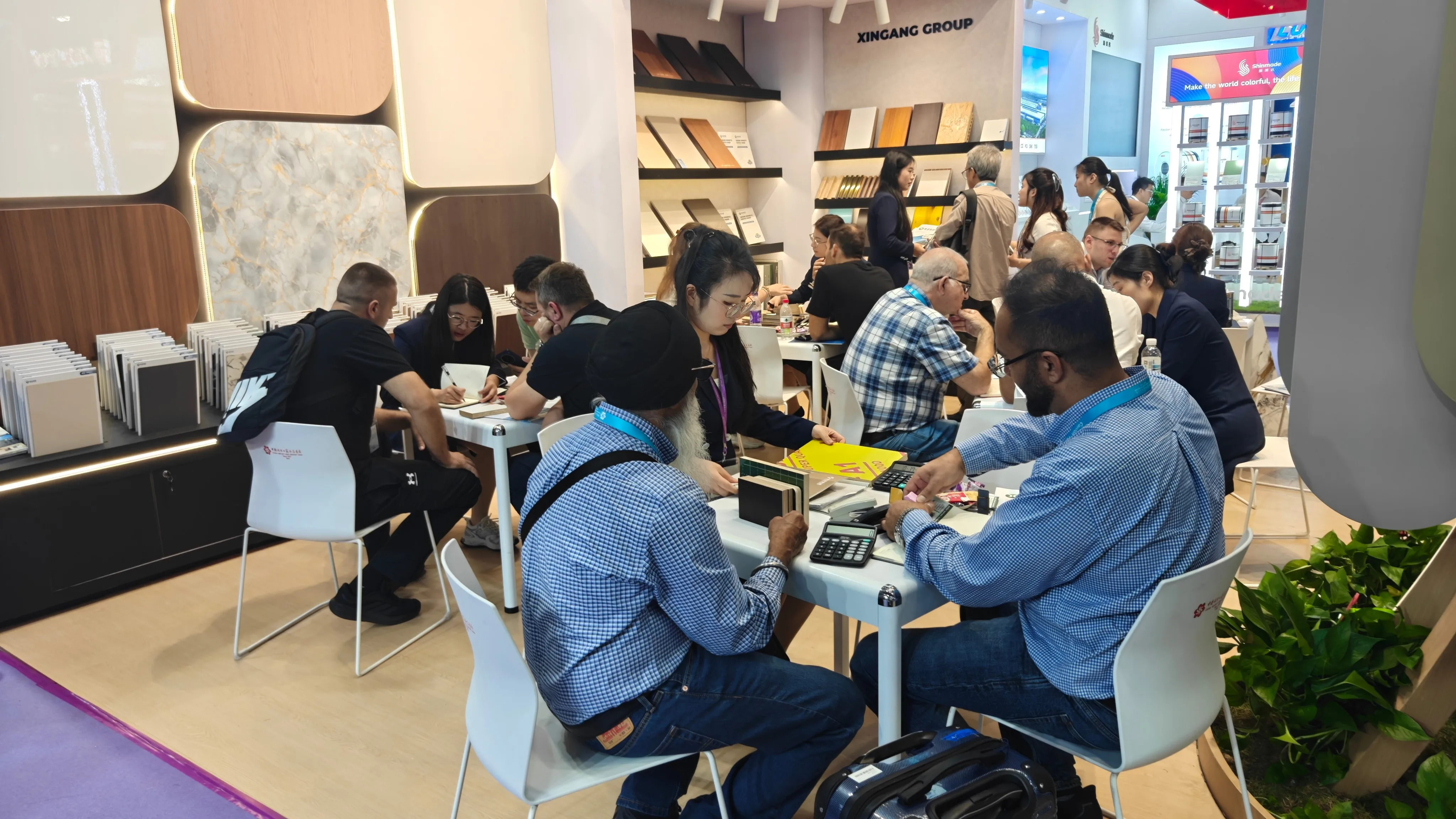 Buyers seated across the Xingang negotiation area at the 140th Canton Fair