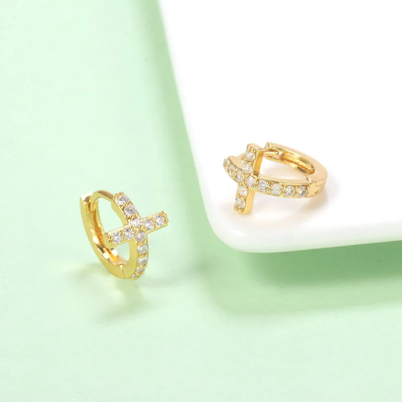

small cross ear huggies earrings gold