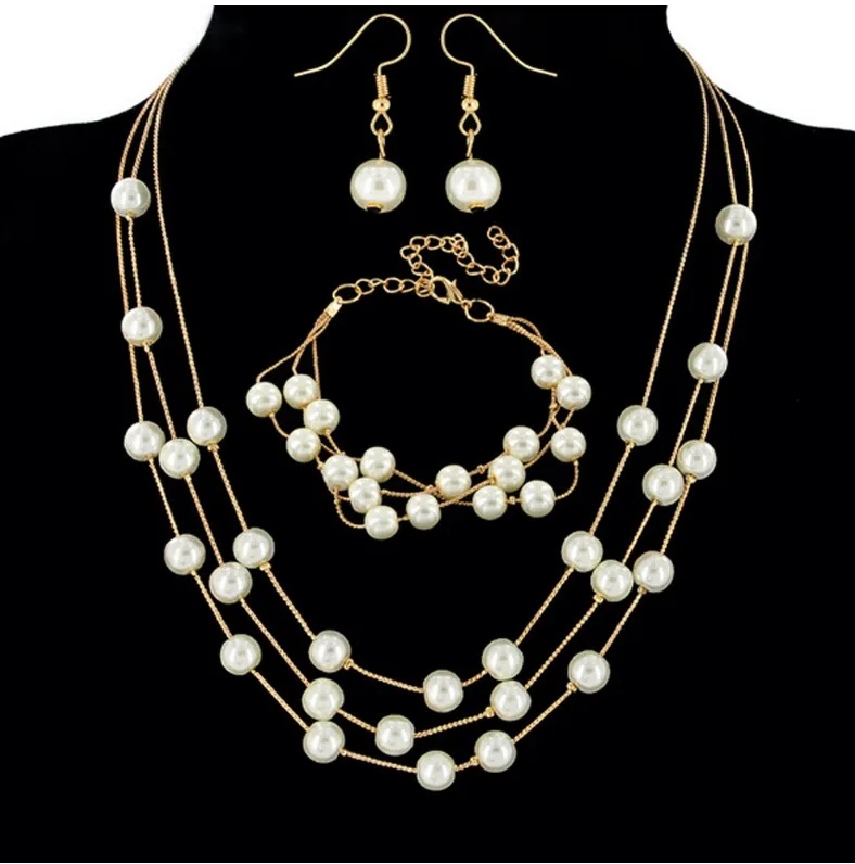 

Hot Fashion sweet elegant pearl temperament necklace earrings bracelet set three-piece set women jewelry, Picture shows