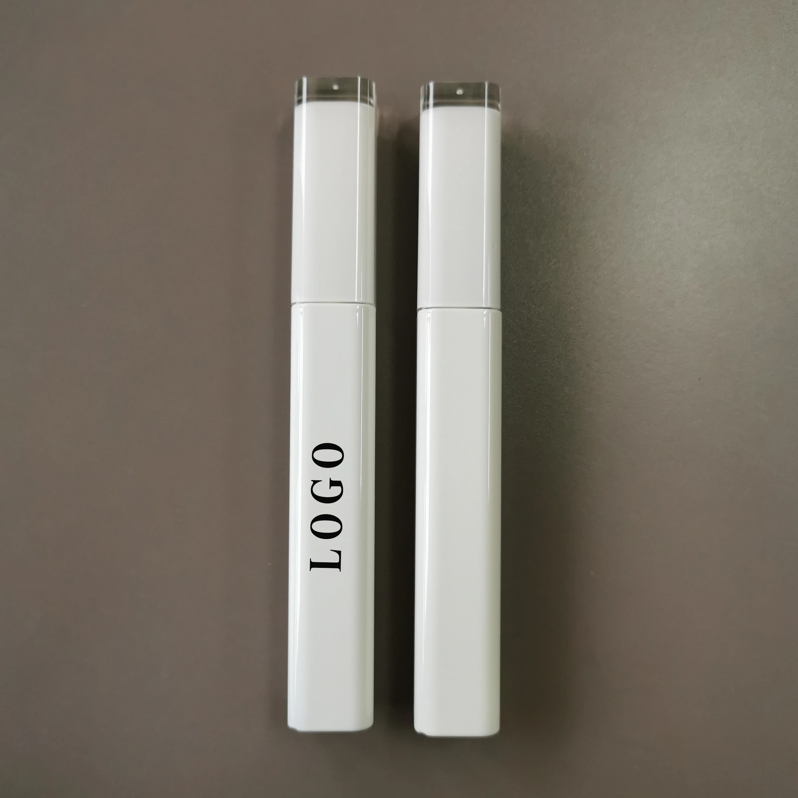 

White tube 10 ml custom broken hair finishing stick styling gel with private label