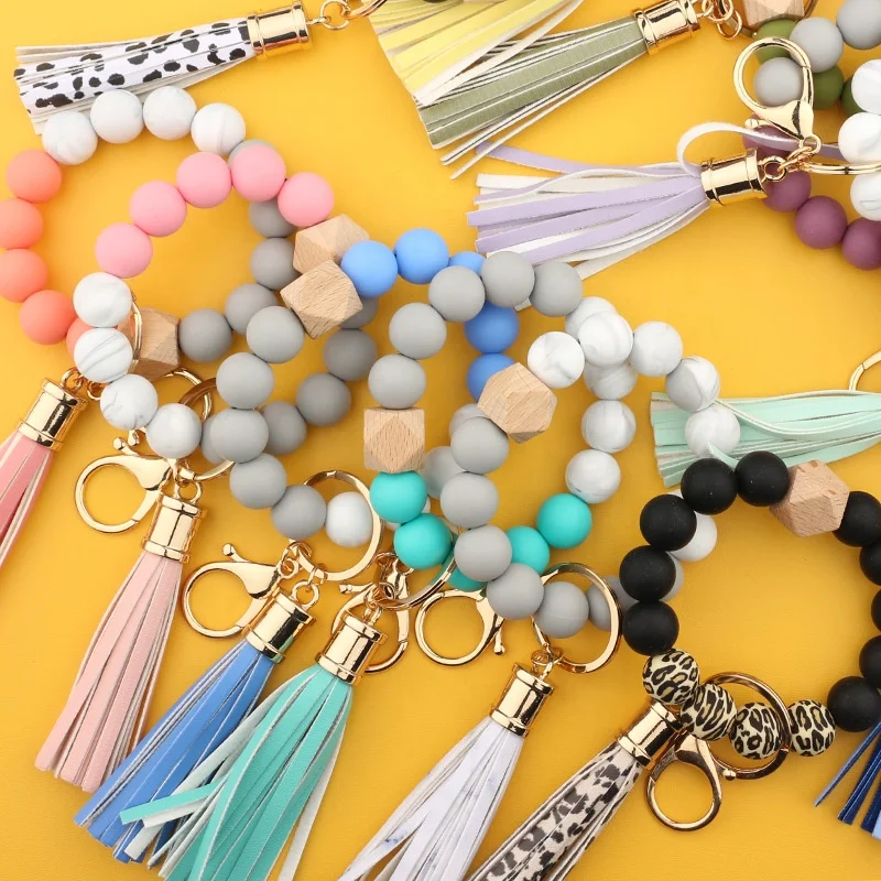 

2021New Leather Tassel Bangle Jewelry Wristbands Silicone Wood Beads Bracelet Bead Pendant Keychains Silica Gel Molar Bracelet