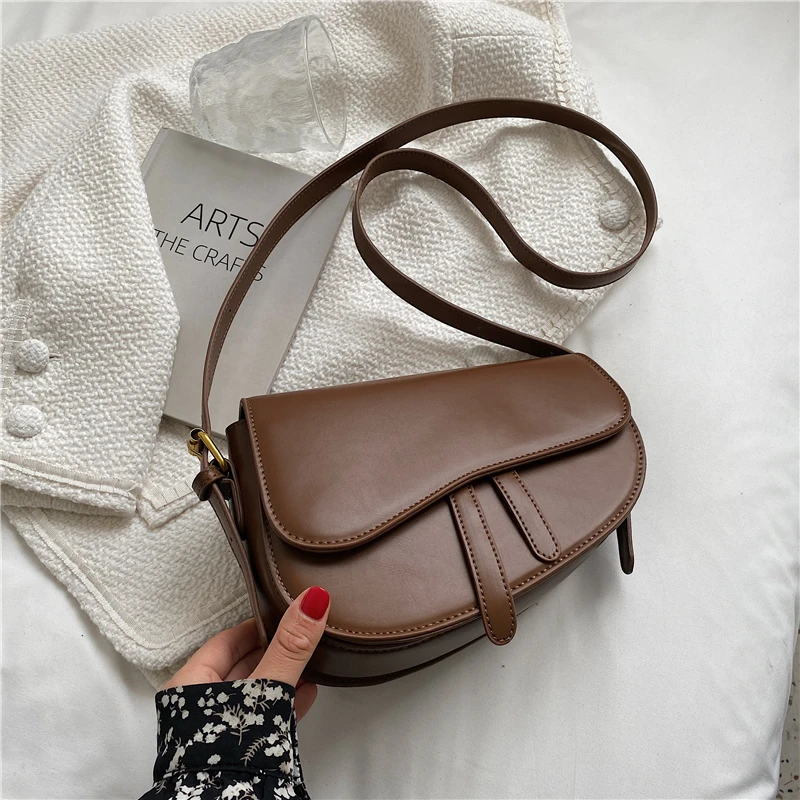 

Creative saddle bag women crossbody bags ladies sling bag new wide shoulder strap vegan leather handbag, Black,red,brown and customzied