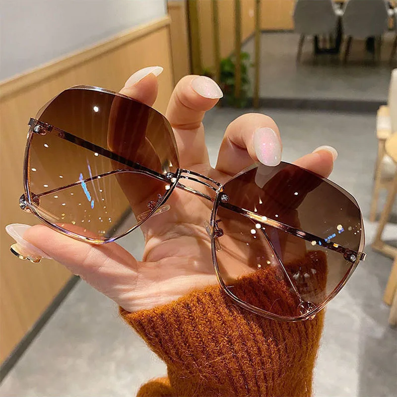 

2022 Luxury Cut-Edge Rimless Ladies Sun Glasses Fashion Nose Bridge Gradient Shades Metal Frameless Female Sunglasses