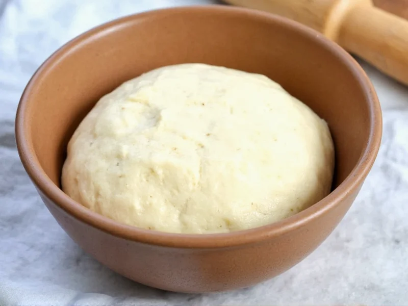 No-knead bread dough in ceramic bowl