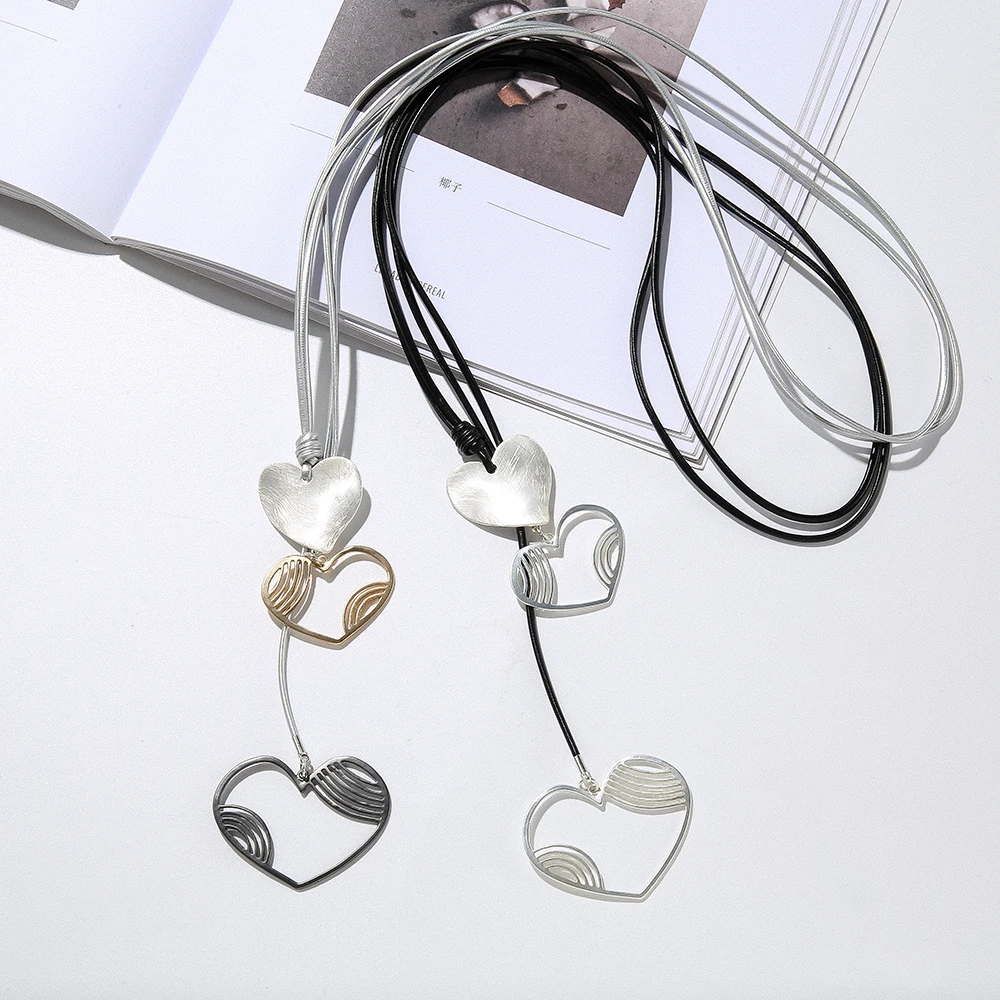 

TongLing double layered two multi rope string layered three open heart pendant long necklace for women