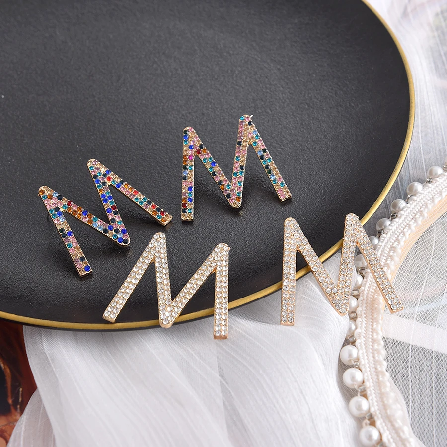 

Kaimei Elegant Jewelry Wholesale Big M Letter Trendy Chic Stud Earrings For Women Girls Bling Colorful Crystal Korean Earrings, Many colors fyi