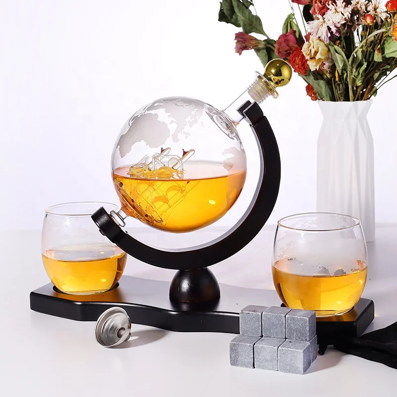 

Amazon Hot Selling Handmade 850ML Whiskey Globe Decanter Spherical map wine decanter With Wood Base with 2 cups, Transparent clear