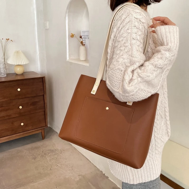 

XP1344 2020 new European and American retro ladies large capacity pu shoulder bag solid color soft bread femininity tote big bag