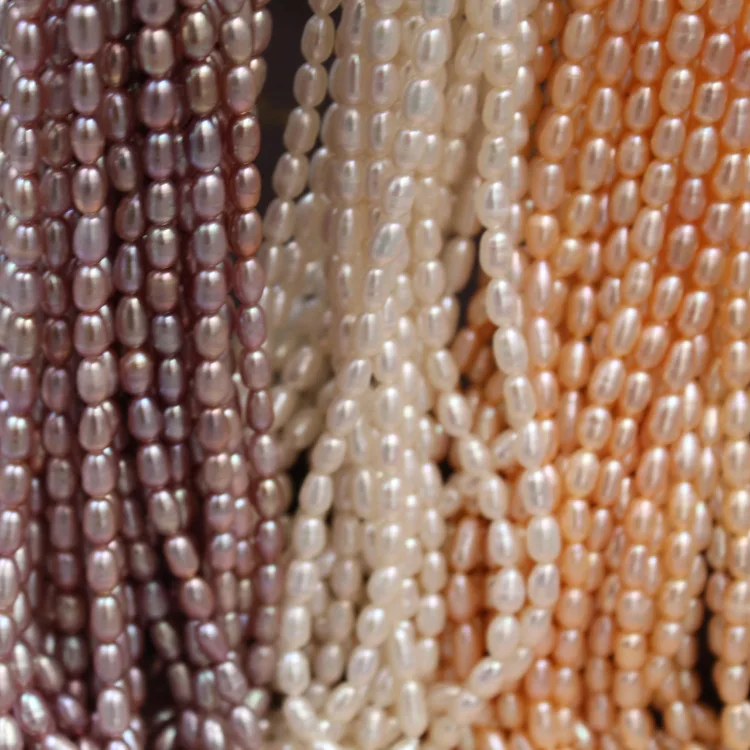 

Wholesale AAA 100% Natural Rice Shape Freshwater Pearl Beads For Jewelry Making DIY Bracelet Necklace Strand 14'', Natural white