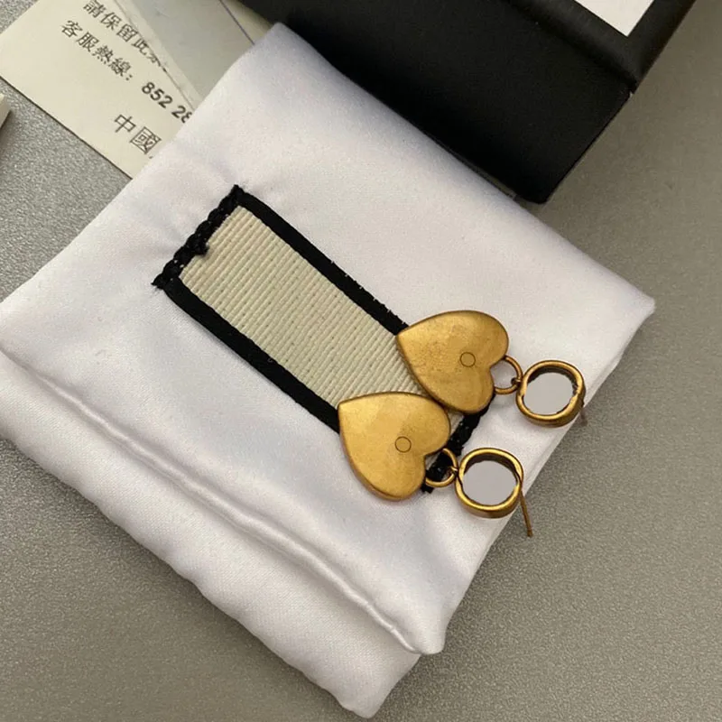 

Personality Heart Pendant Stud Fashion Vintage Hollow Letter Lady Brass Earrings