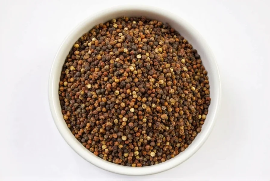 Mixed peppercorns in a glass jar