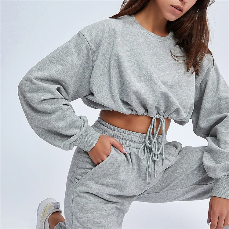 

Wholesale cotton women's loose sweater long sleeve crop top fittness joggers lace up pants with pocket loose casual 2 piece set