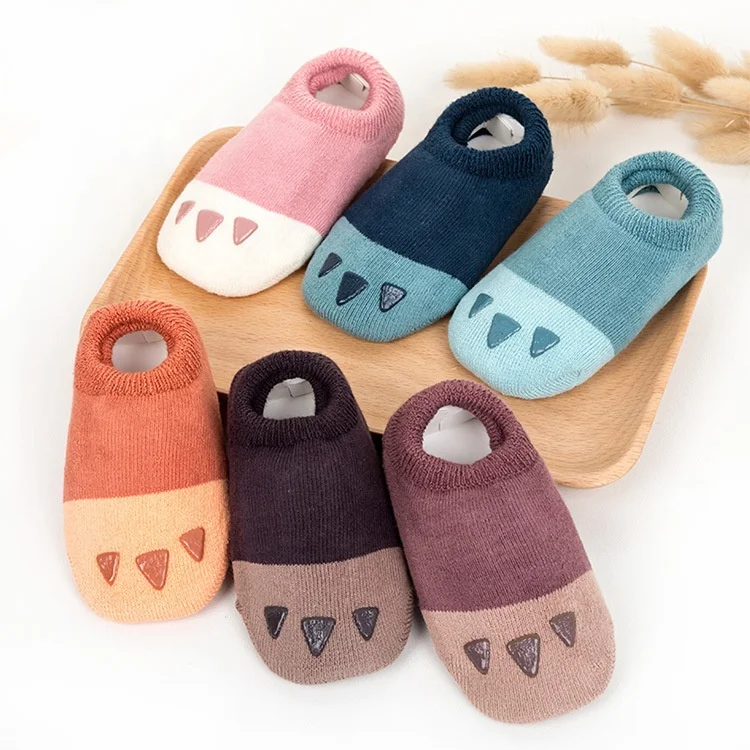 

Lovely baby dinosaur silicone grips non-slip slipper socks, Pantone color