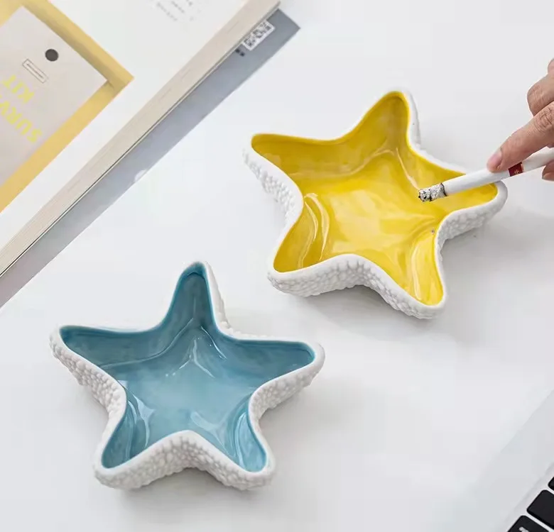 

Cheap hot selling Creative starfish-shaped ceramic ashtray custom logo for home hotel bar, Blue and yellow