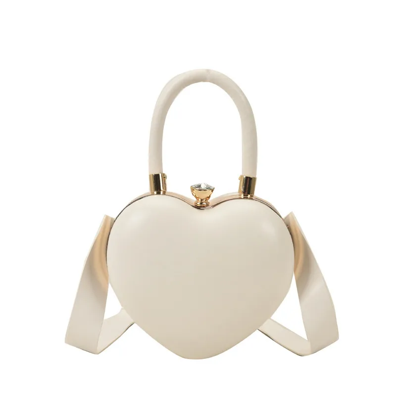 

Texture love clip mouth single shoulder women's bag 2021 new autumn Rhinestone pottery bag foreign style portable girl's heart b, Customizable