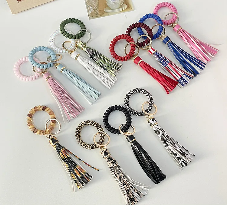 

Telephone Wire Plastic Wrist Frosted Key Ring Large Flat Wire Bracelet Hair Ring With PU Leather Tassel