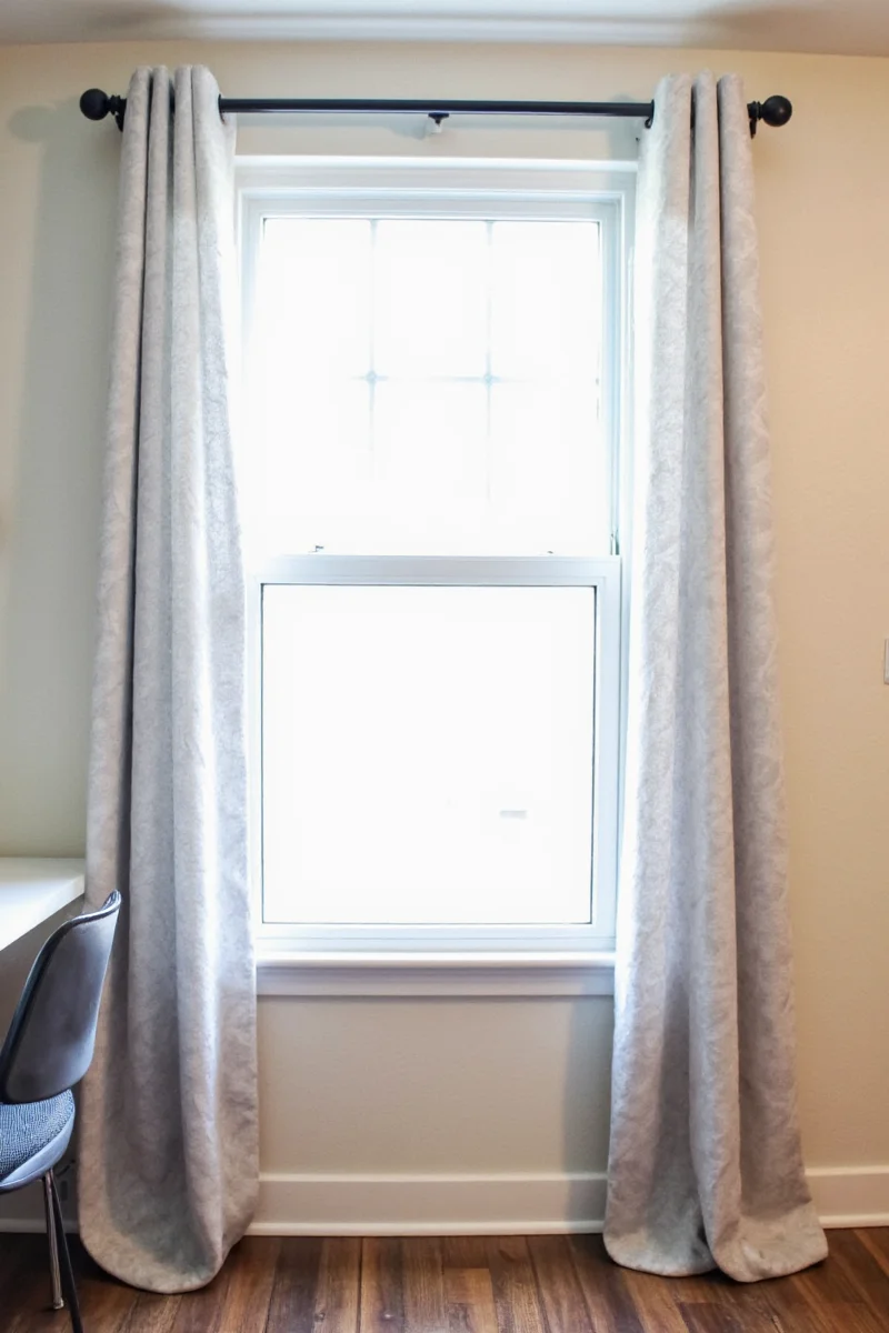 Holiday-themed curtains using command strips for festive decor