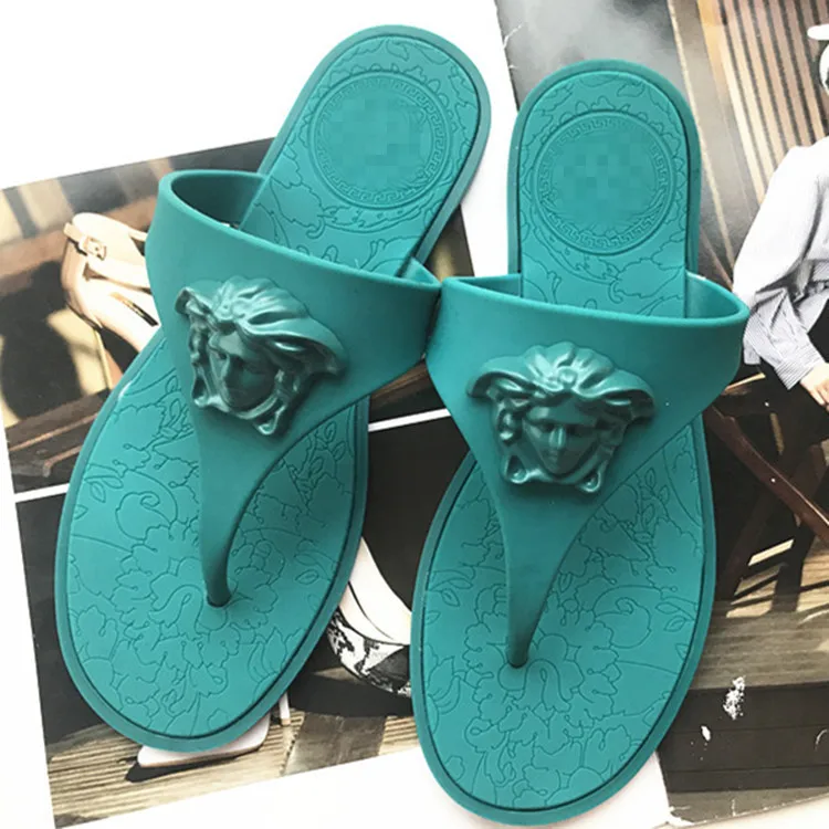 

Hot seller jelly flats women's shoes head with face herringbone casual beach shoes multi-color flip-flops for women