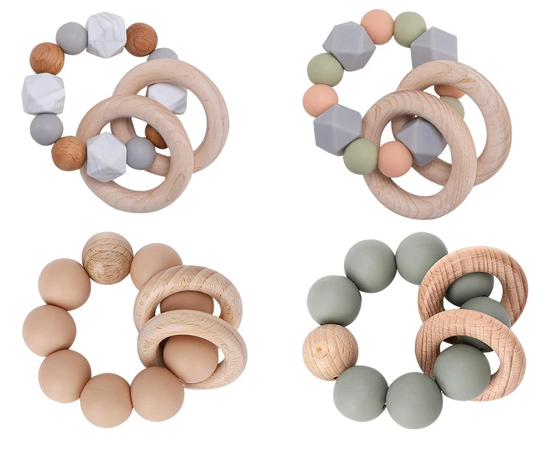 

Amazon Hot Selling Safe Baby Wrist Beech Wooden Teething Toys Chewing Bracelet Teether Diy Newborn Baby Teethers