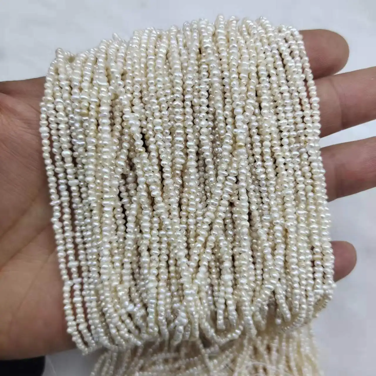 2-3 mm Near Round Freshwater Pearl Fewer Luster in Strand Wholesale Freshwater Pearl Strand