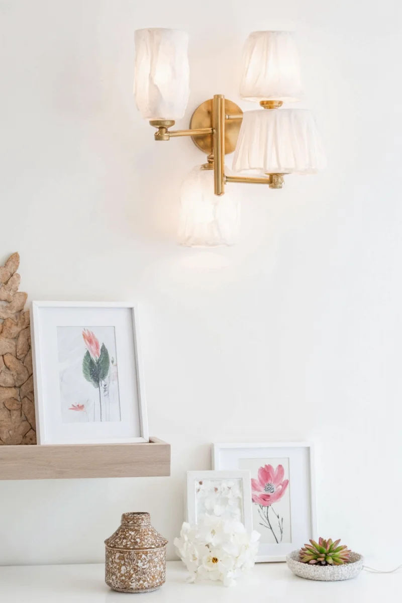 Kitchen area with sconces above an island