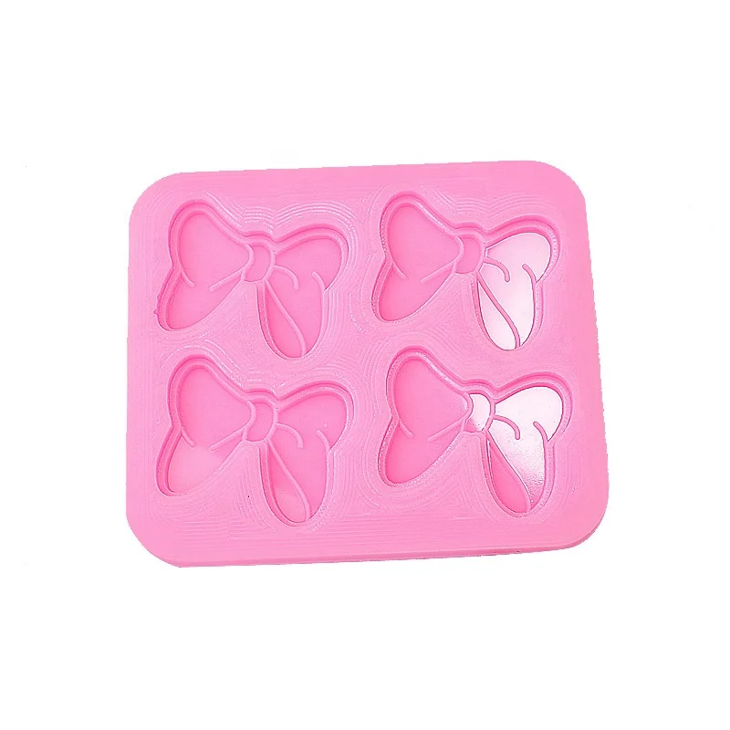 

4 Hole BowsCartoon Butterfly Tie Silicone Mold Tools for Make Chocolate Hard Candies Dessert Ice Cube Candle Cake Fondant, Pink