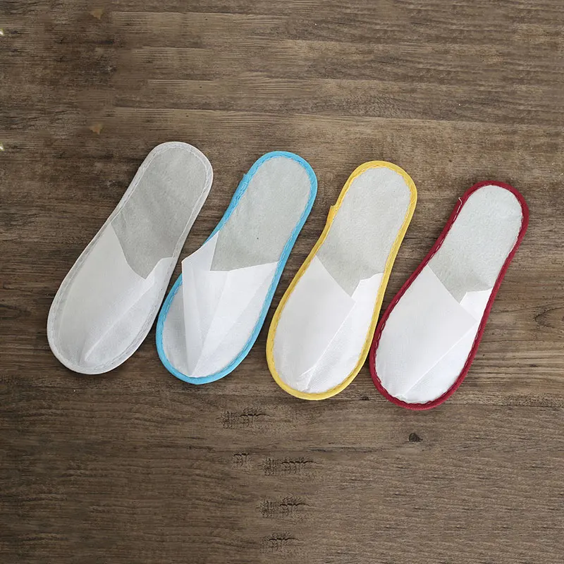 
Wholesale cheap dispos slipper for hotel indoor and outdoor guest non woven disposable slipper unisex 