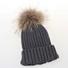 China Custom Beanie Winter Hat Woven Ladies Knitted Hat With Pom Pom