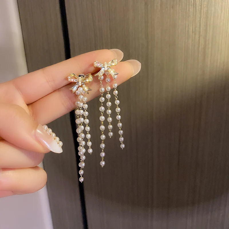 

trendy fashion pearl long bow decor earrings women