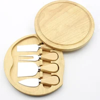 

Unscrewed rubber wood box set with 4 piece knife set round cheese board