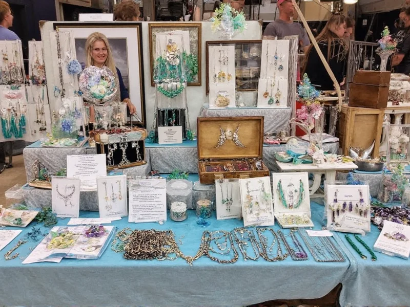 Handmade coastal jewelry display at Thunder on the Gulf crafts festival
