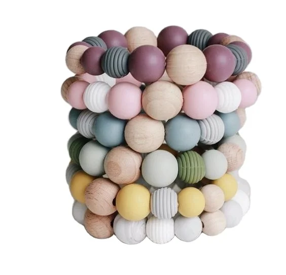 

Hot selling baby teething toy bracelet food grade wood teether ring, Make with clients' designs with pantone color codes