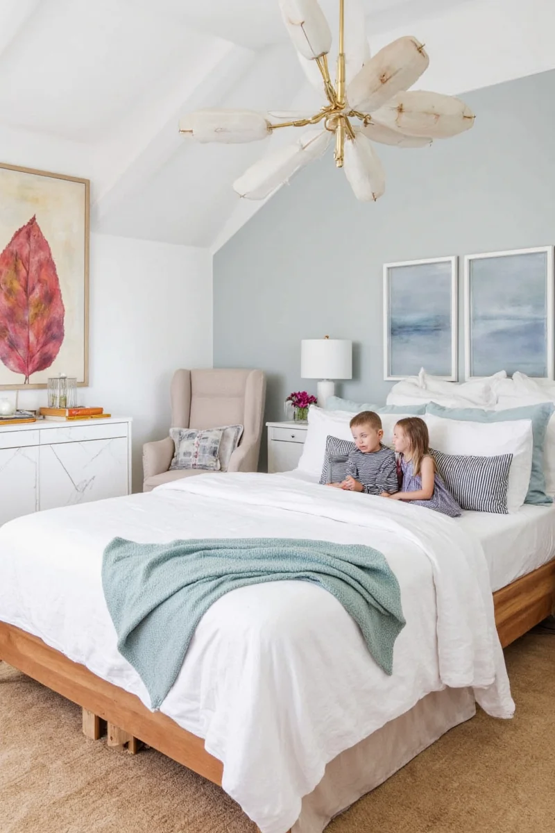 Family-friendly master bedroom with child-safe over-the-bed decor
