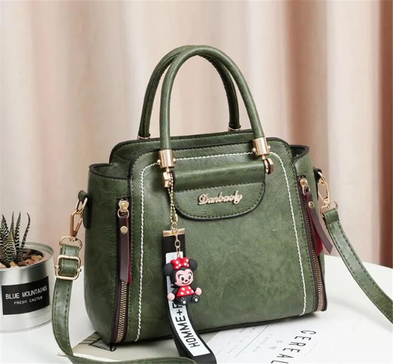 

Factory high quality mini handbag women min metal LOGO