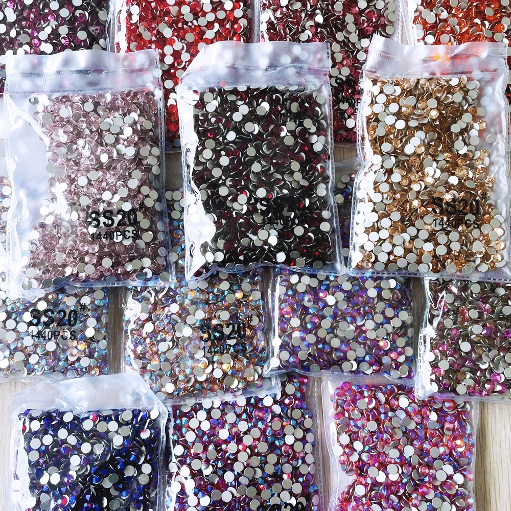 

Most Popular in Non Hotfix Rhinestones for Nail Decoration Wholesale Factory Over 100 Colors Crystal 2 Bag Sewn Rhinestones Set