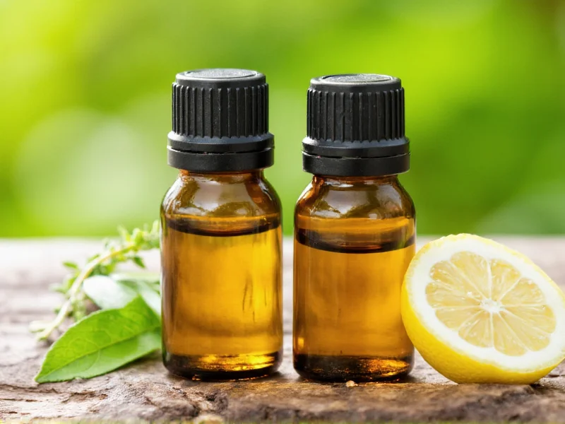 Citronella and lemongrass essential oils in glass bottles