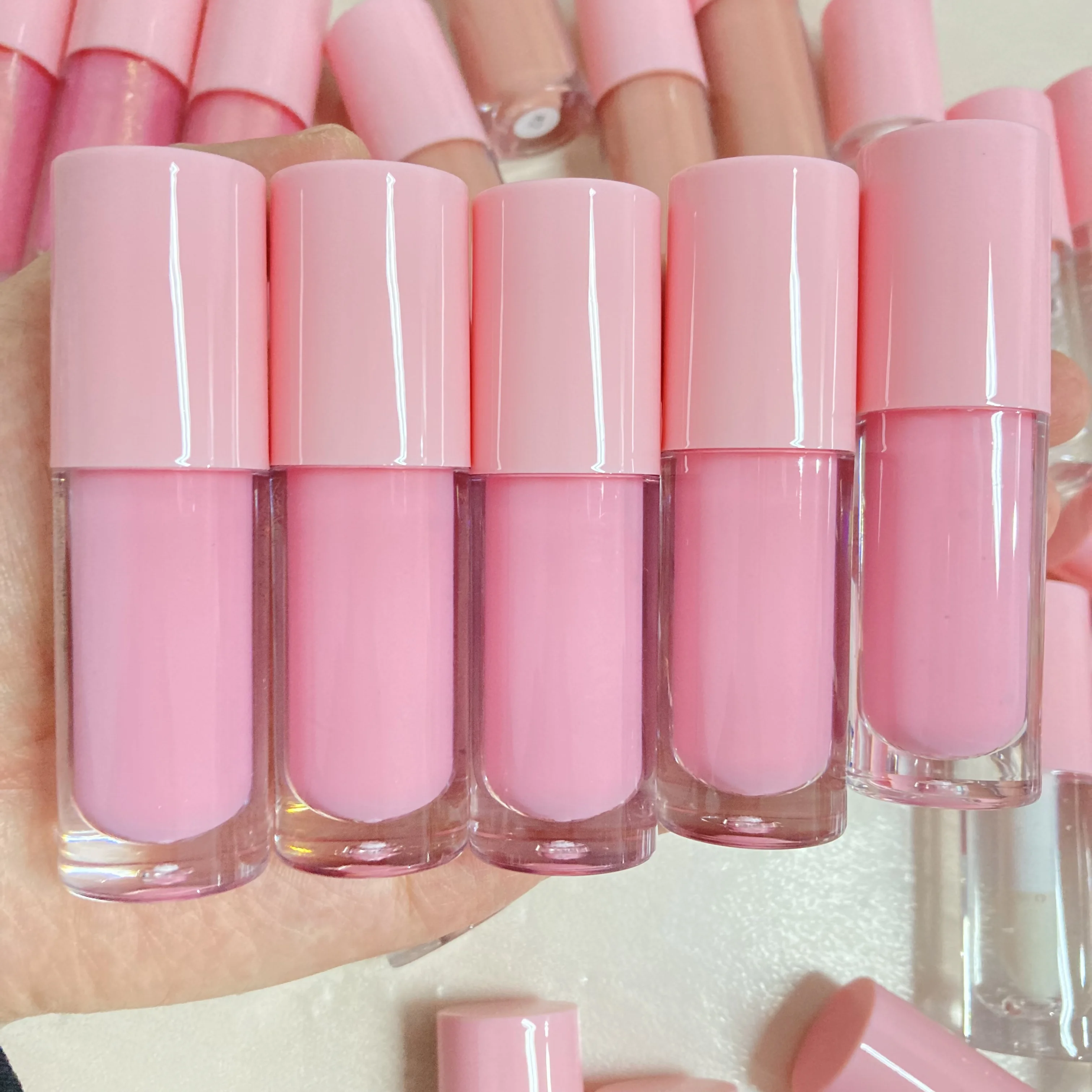 

Thick moisturizing nude pink brown clear lip gloss pink tube private label
