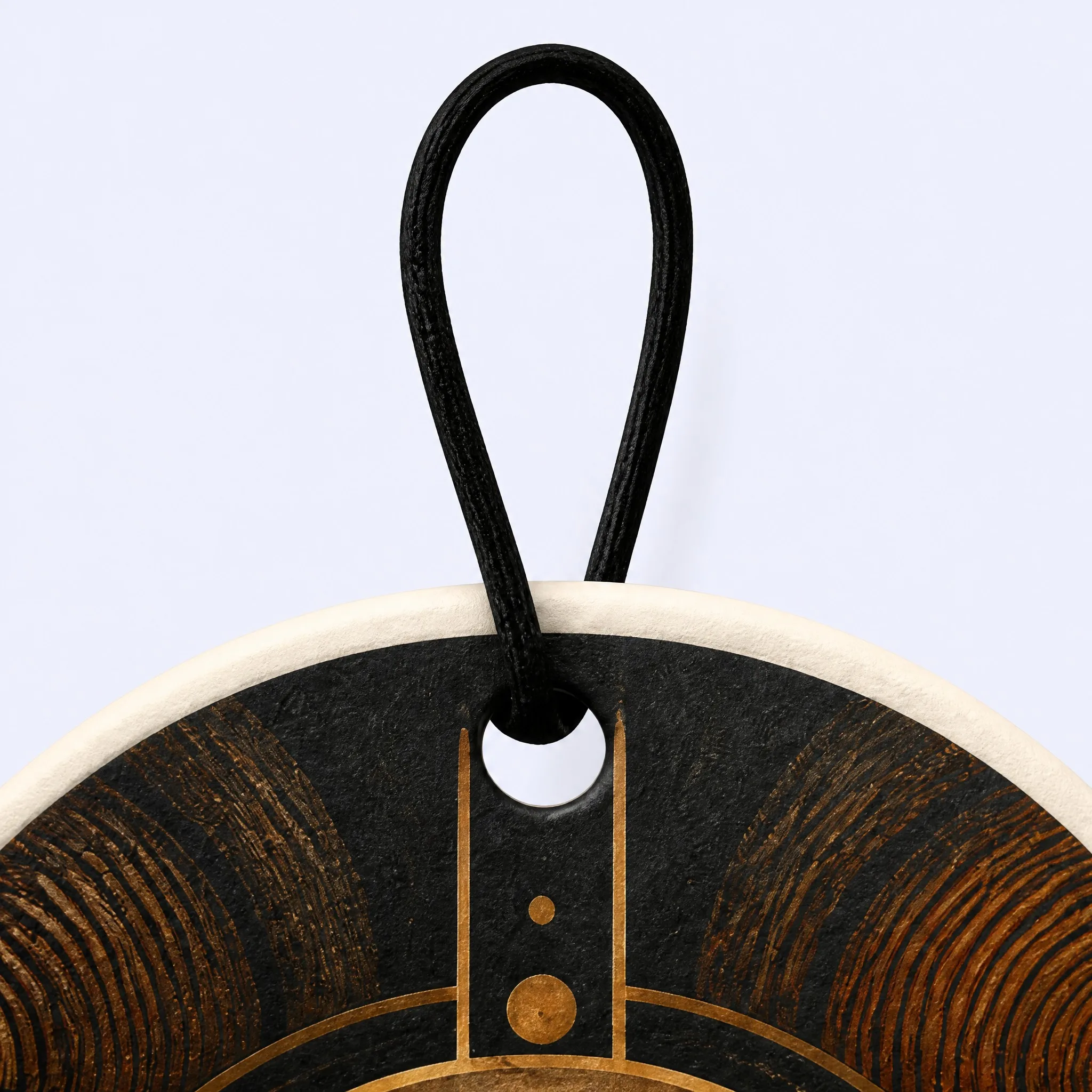 Top Detail of Forest Air Freshener with Elastic Cord Loop and Concentric Woodgrain Rings