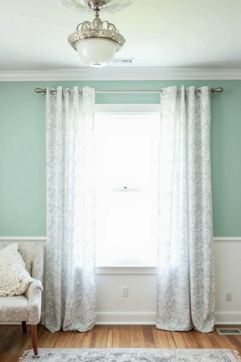 Over-the-door curtain rod with fabric panels