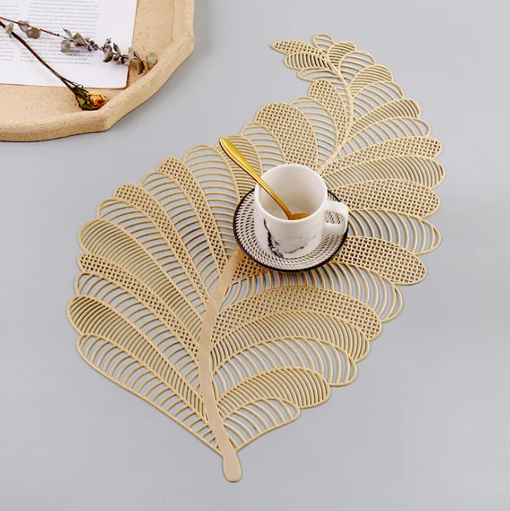 

2022 Eco-Friendly Stocked Customized Leaves Wholesale Placemats Table Mat PVC Placemat Gold
