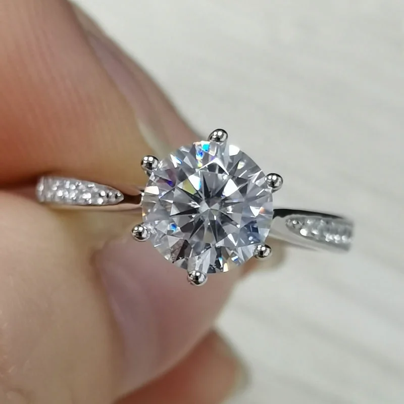 

Sterling Silver White Gold Plated 3 Carat Moissanite Diamond Ring With CZ Accent