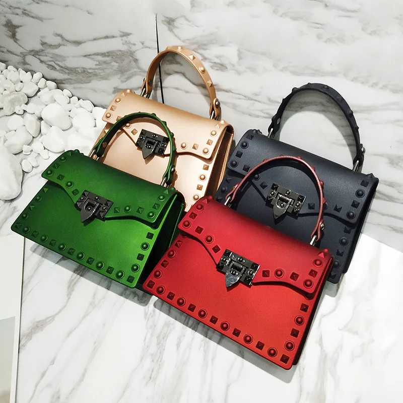 

Newest Fashion Famous Brands Handbag Ladies Pvc Jelly Candy Shoulder Hand Bag 2022 Luxury Purse And Handbag For Women Rivet Bag, Multi color