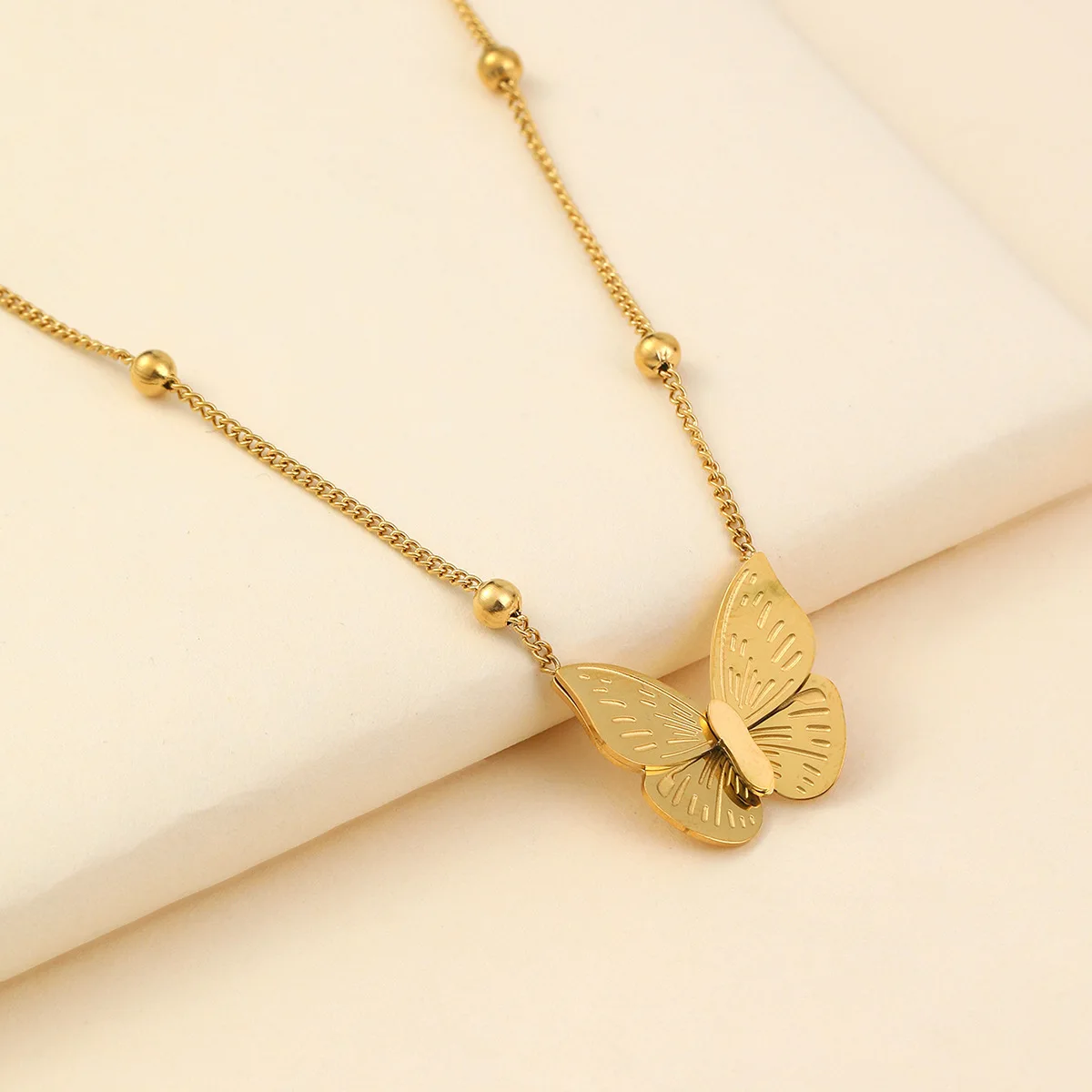 

Factory Cheap Wholesale Price 18k Gold Necklace Hollow Pendant Necklace Stainless Steel Engraved Butterfly Necklace for women