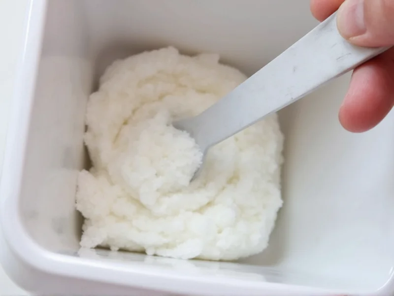 Homemade detergent in dispenser with measuring spoon