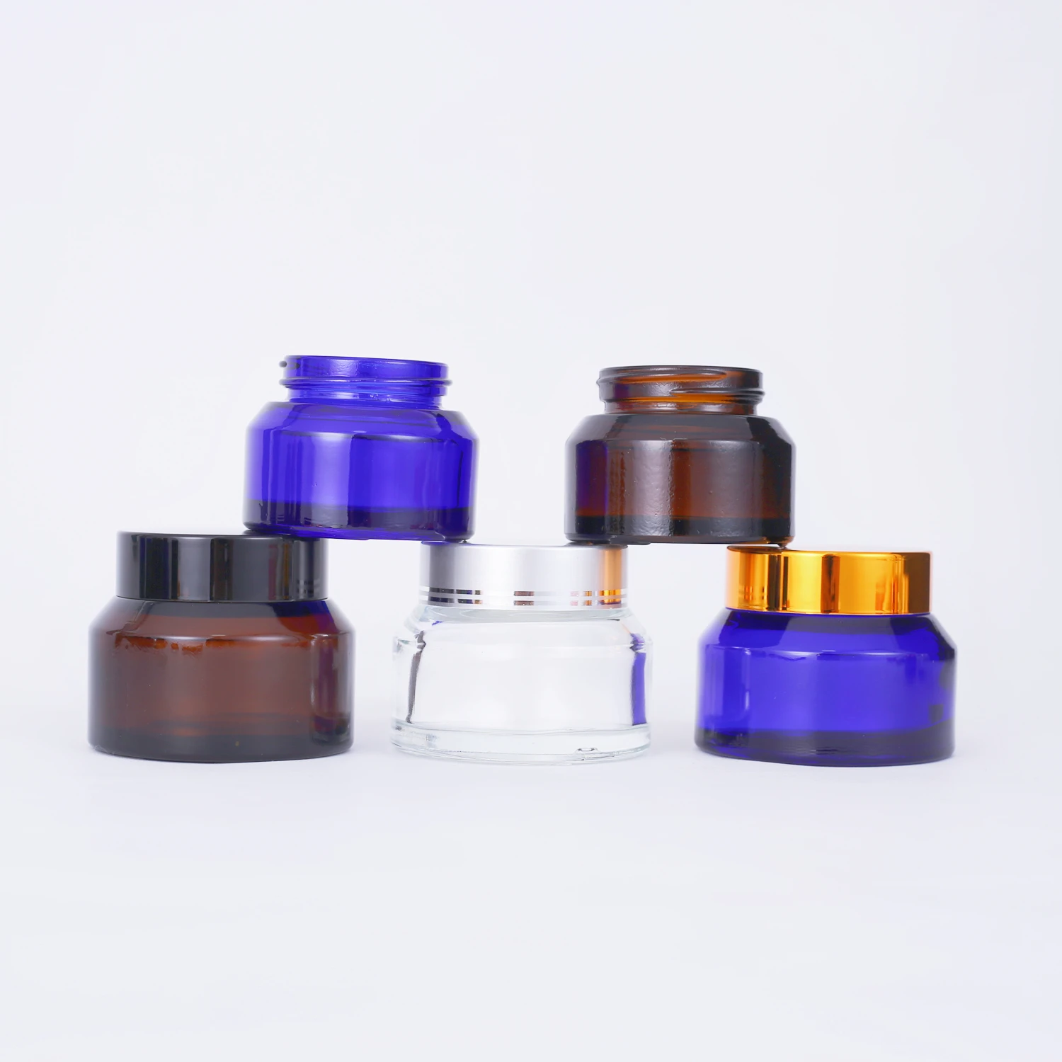 

15ml 30ml 50ml Oblique Shoulder Blue Amber Celar Body Face Eye Cream Glass Cosmetic Jar With Black Gold Lids