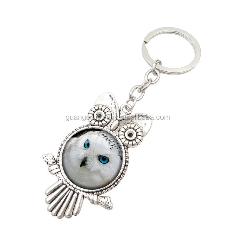 
GCK17-518 Yiwu Guangcui Wholesale custom metal owl shape crystal glass keychain 