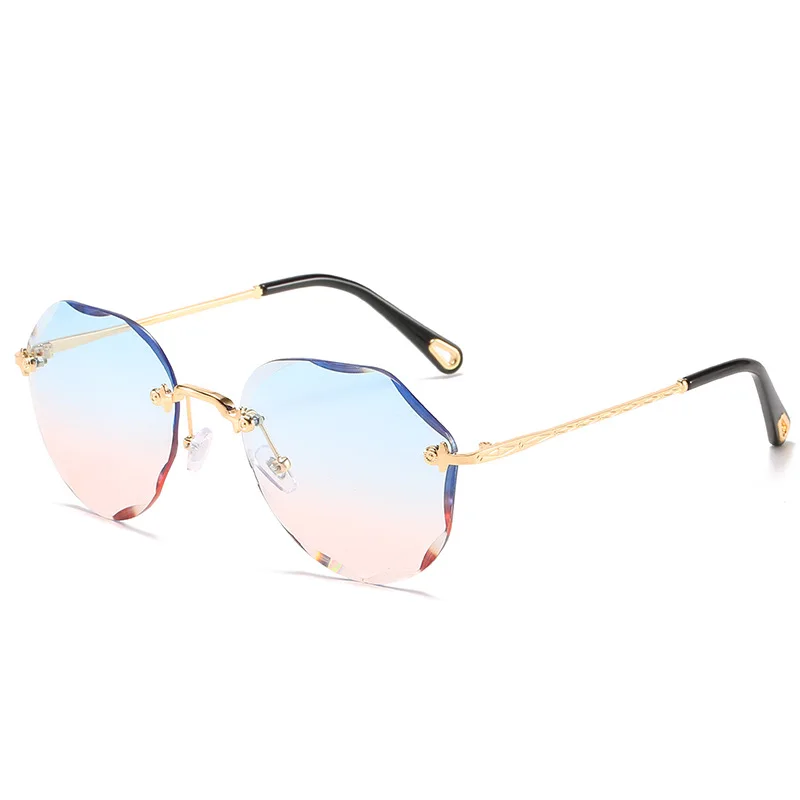 

Wholesale Women Fashion Rimless Round Sun Glasses 2021 Diamond Cut Hexagon Metal Frameless Circular Rimless Sunglasses, Mix color