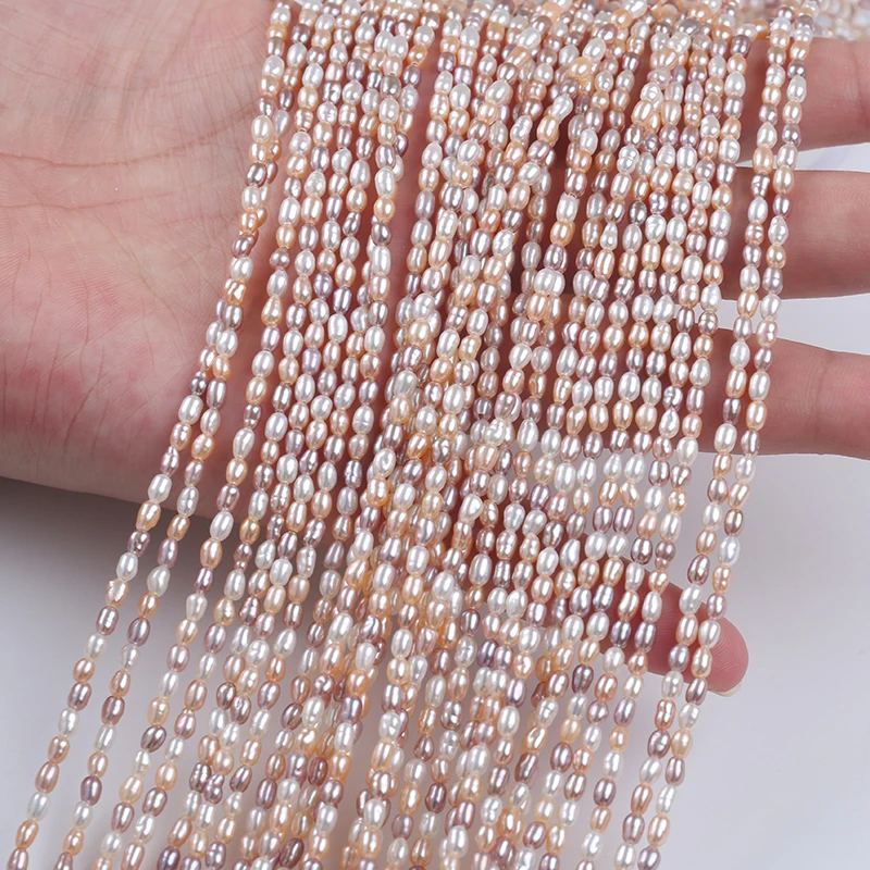 

Wholesale Natural White Pink Purple 2-2.5mm Rice Freshwater Pearl Strands